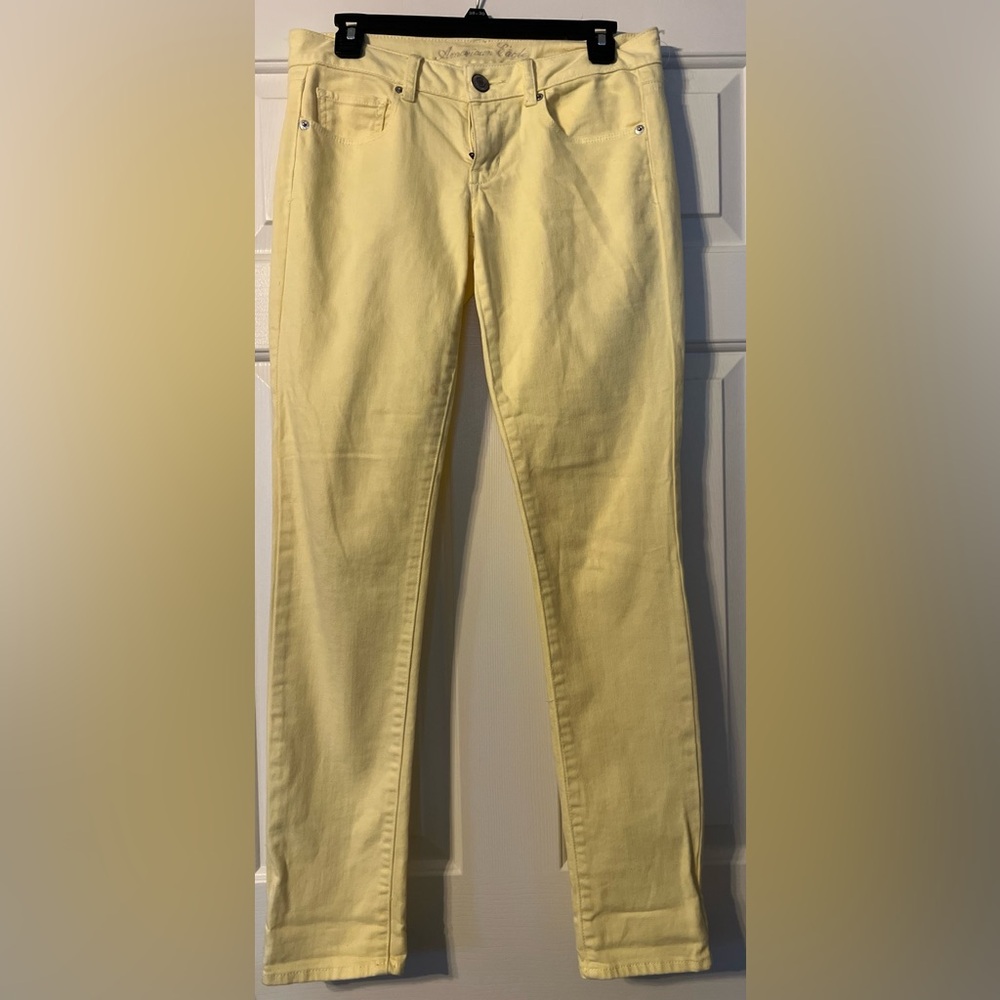 AE yellow skinny stretch jeans